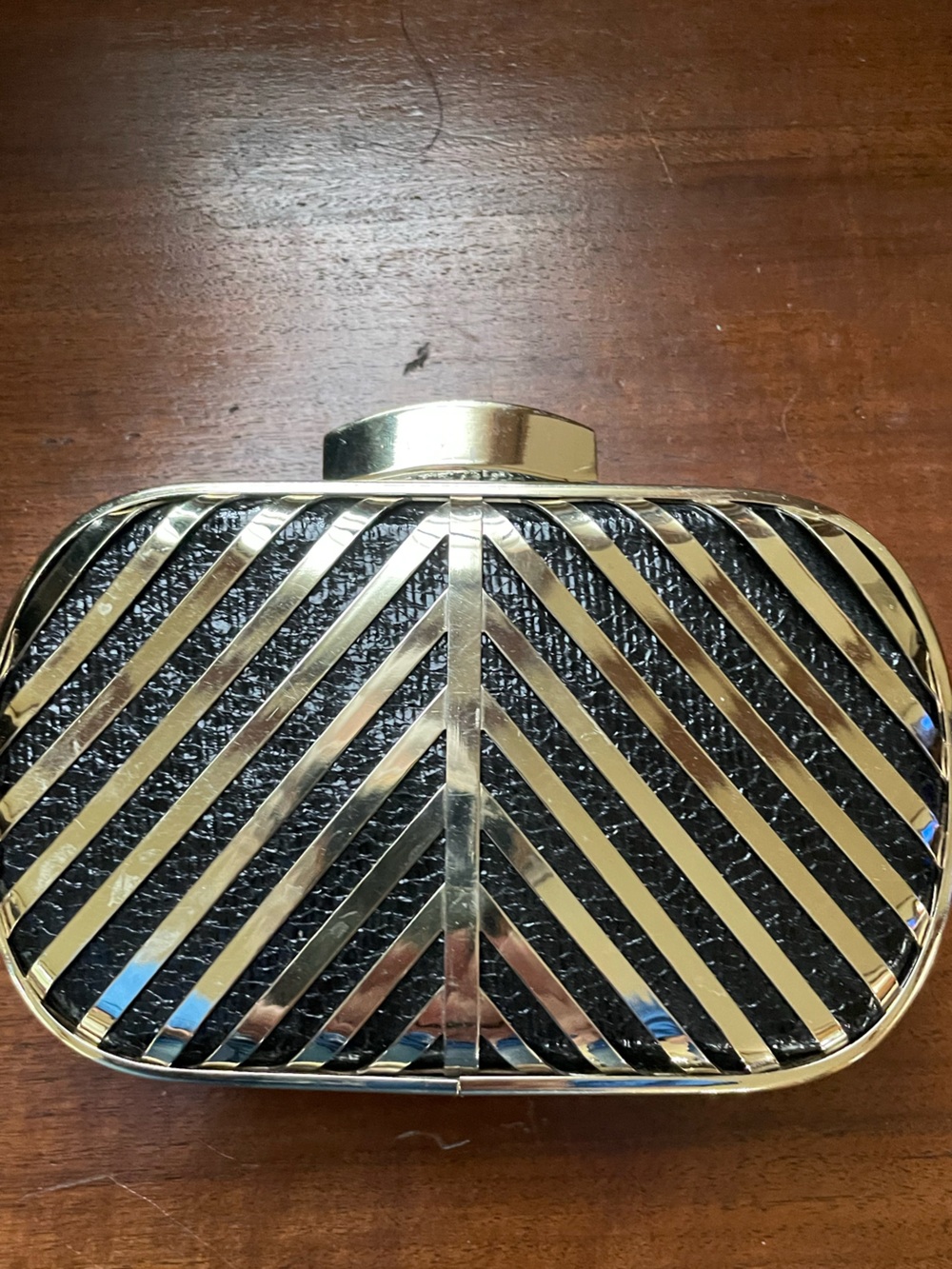 Hard Case Gold and Black Clutch